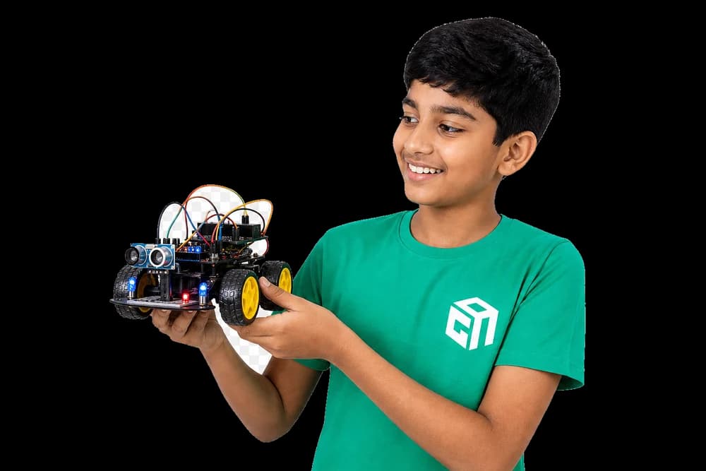 GeekashramJr student in Geekashram t-shirt building a robotics project